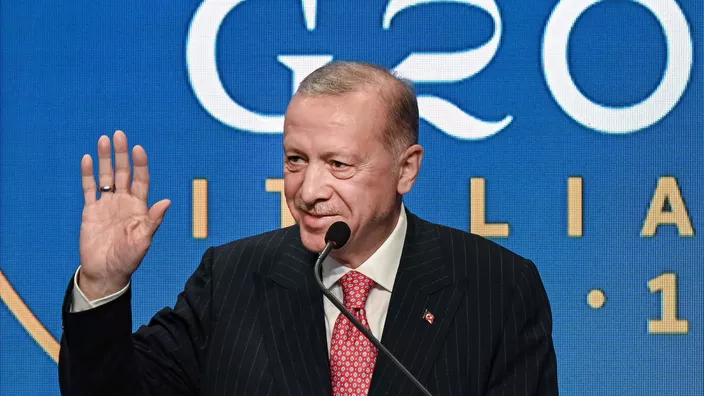 Désarmement du PKK en Turquie: devant les membres de son parti, Erdogan se veut rassurant